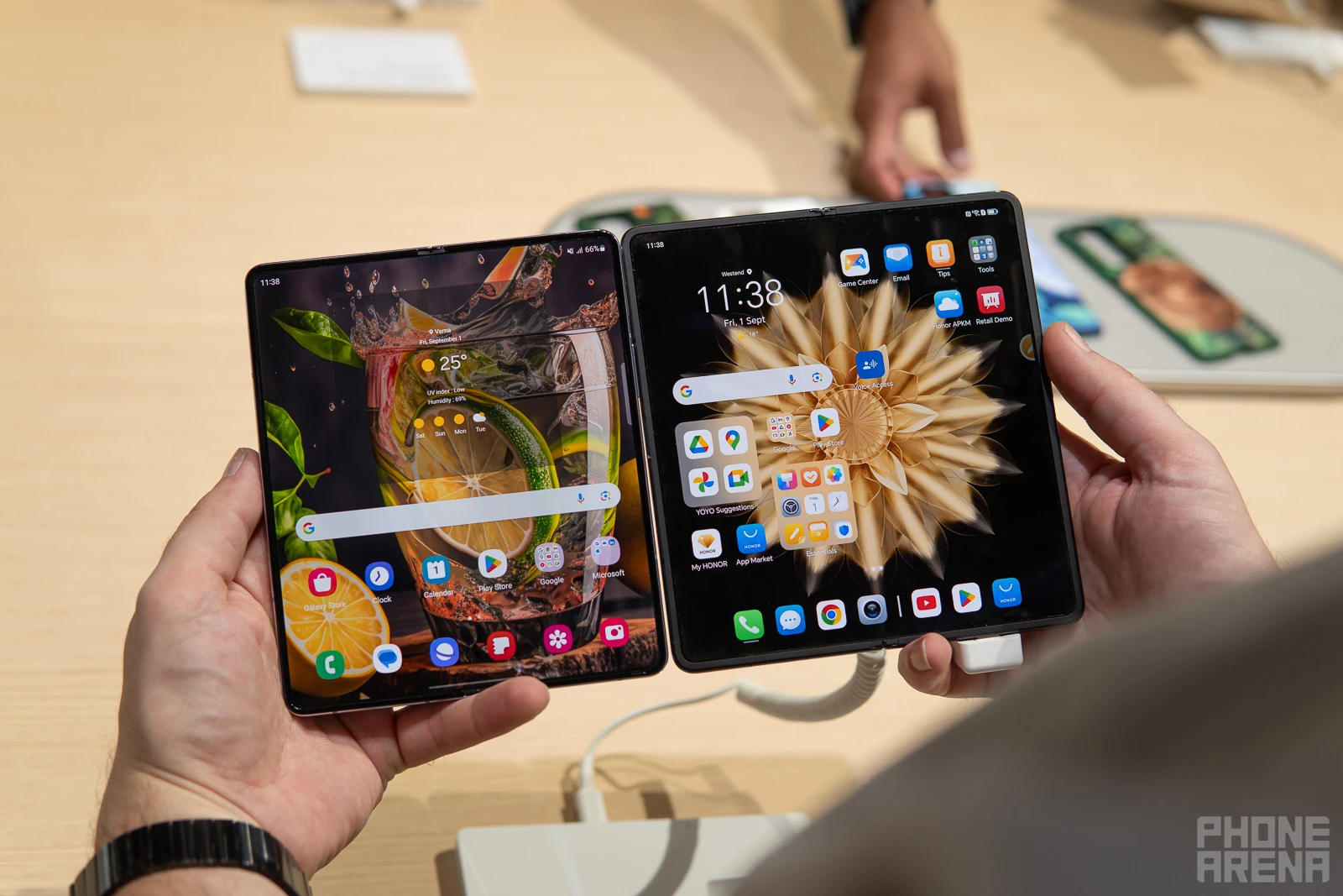 Galaxy Z Fold 5 next to Honor Magic V2 (Image credit - PhoneArena) - Honor Magic V2 hands-on: thin on the outside, packed to the brim on the inside