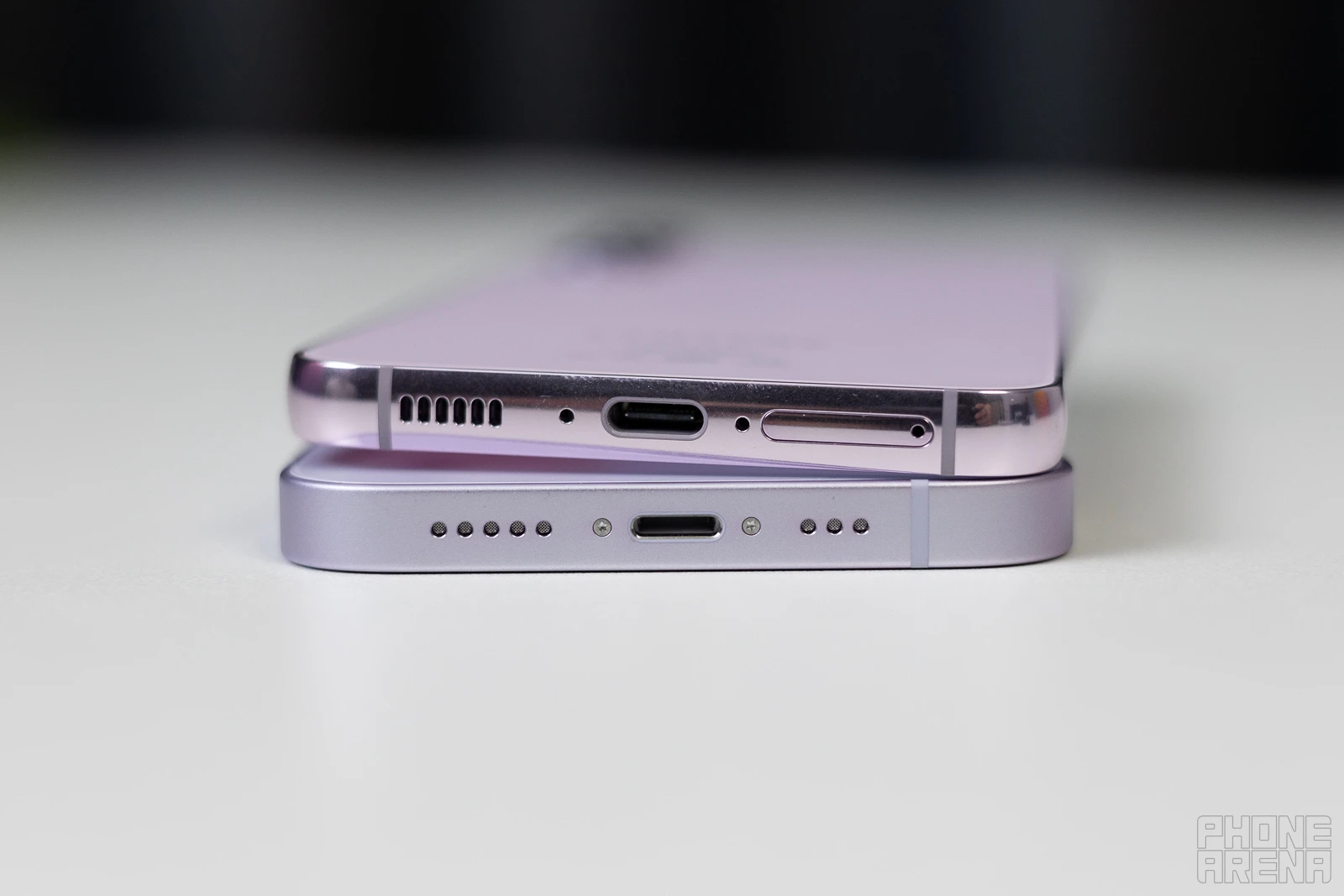 Galaxy S23 and iPhone 14 speakers (Image credit - PhoneArena) - Samsung Galaxy S23 vs Apple iPhone 14: more for your $800!