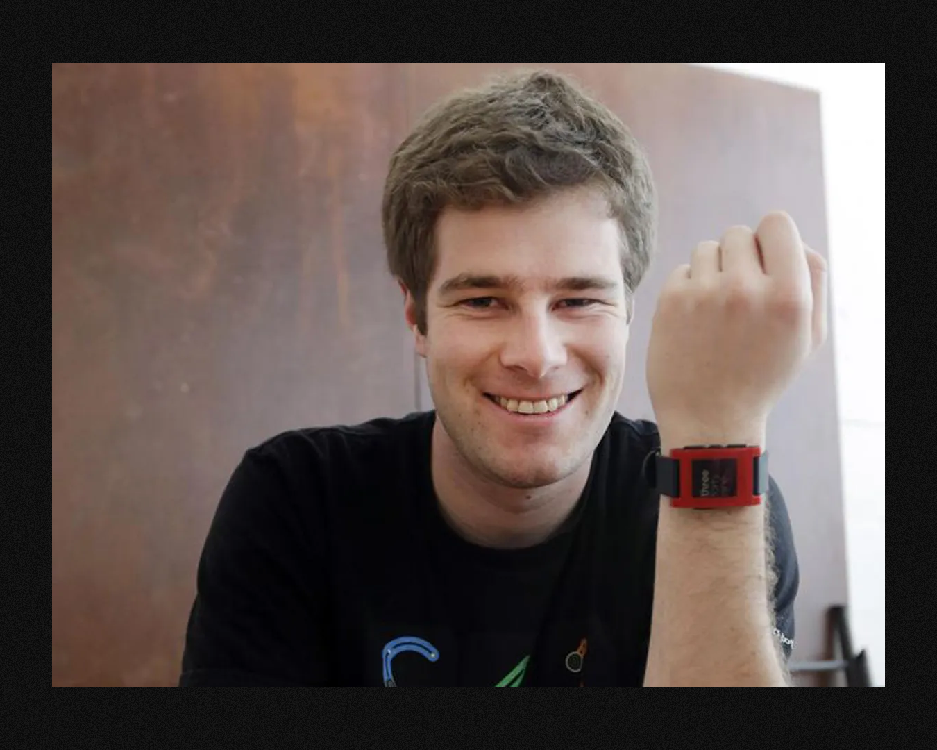Eric Migicovsky wearing the original Pebble